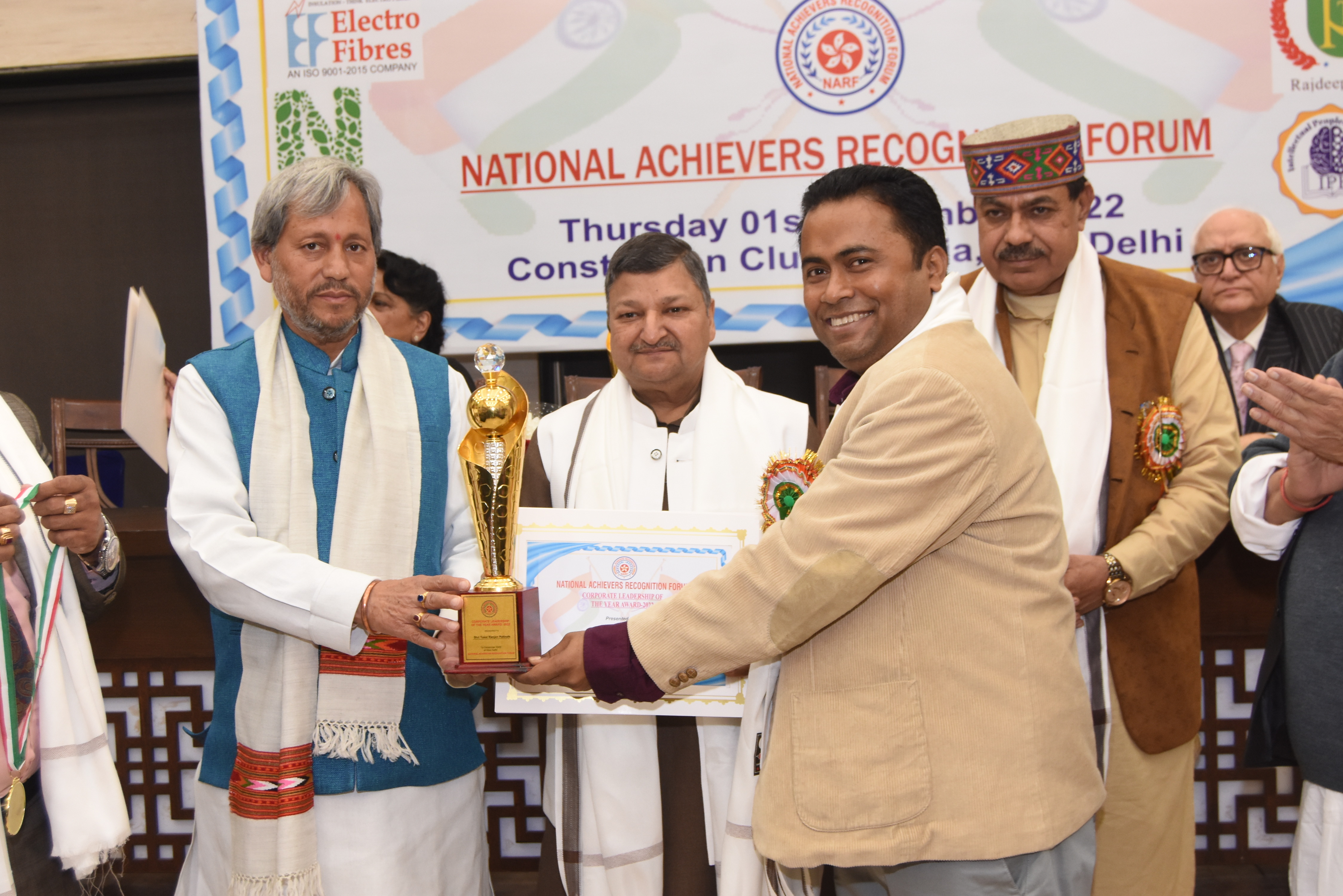 Sh. Tusar Ranjan Pattnaik Receiving the Award From Sh. Tirath Singh rawat Former Chief Minister Uttarakhand. 